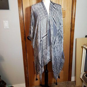 Top it‎ off, swimsuit cover with tassels